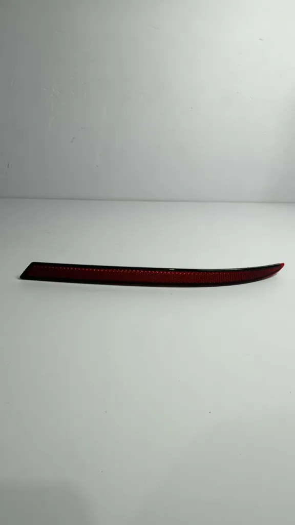 Reflektor pasem majtas