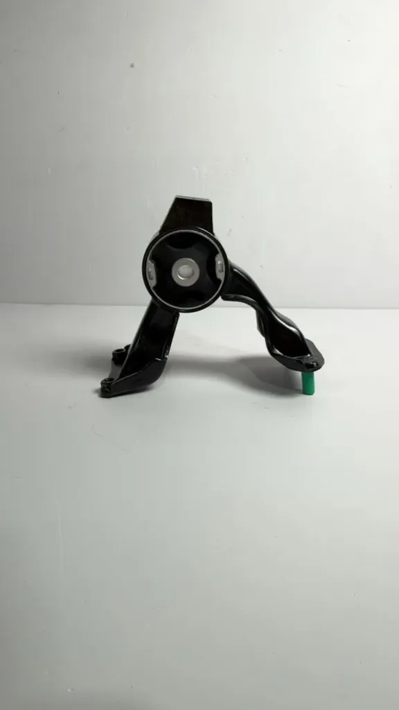 Mbajtese suspensioni pasem e grupit motorik / Rear suspension bracket of the engine group