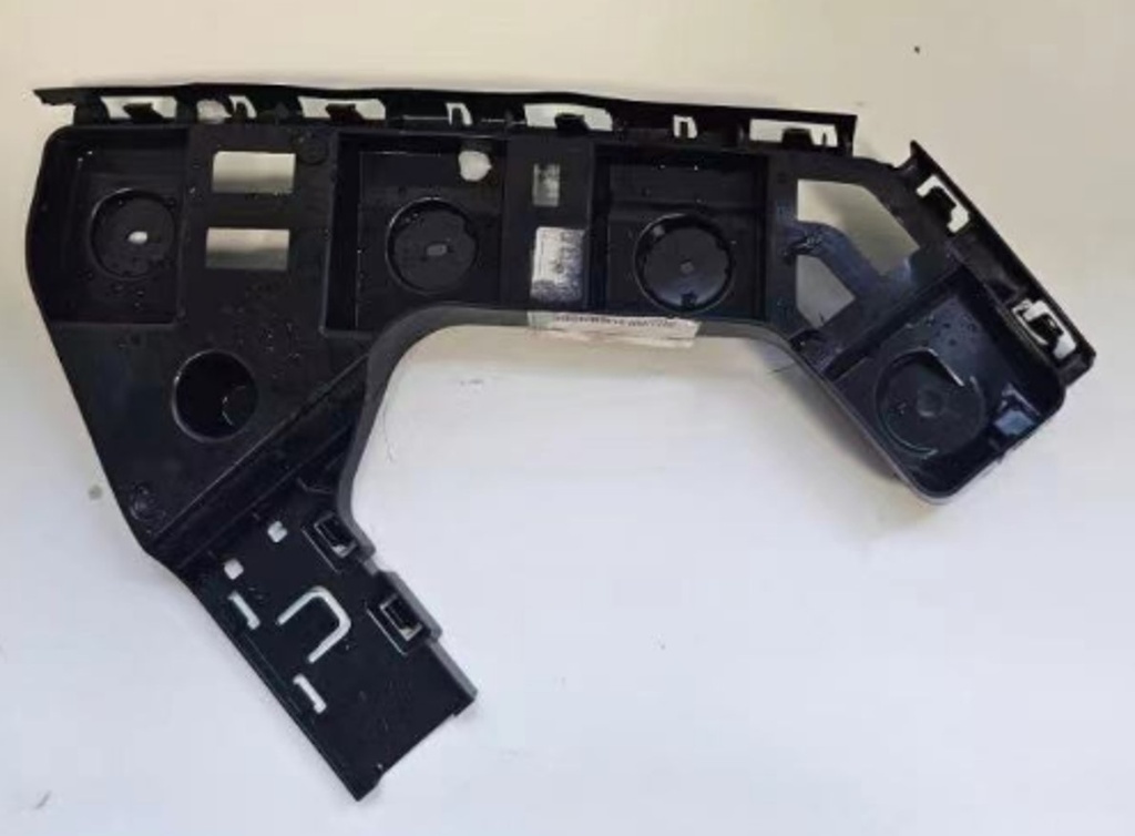 Mbajtese parakolpi pasem majtas / Rear left bumper bracket